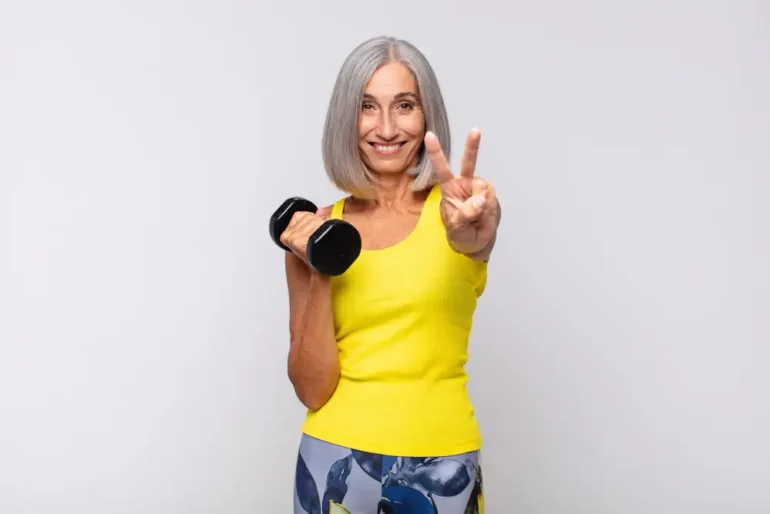 Vrouw met dumbbell